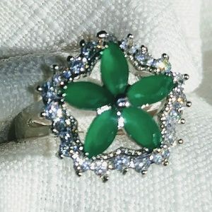 Emerald and white topaz ring